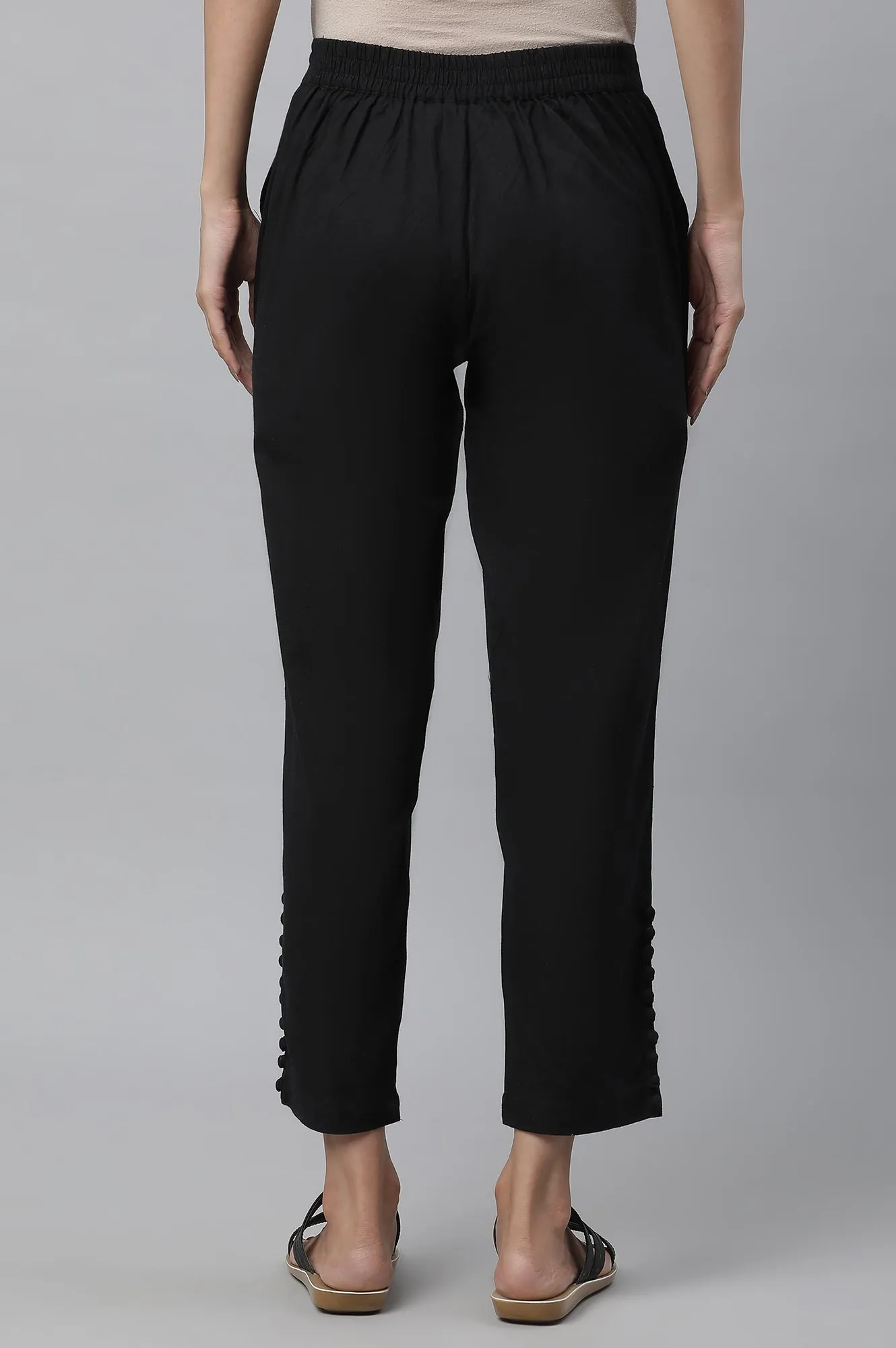 Black Narrow Trousers with Buttons on Hemline